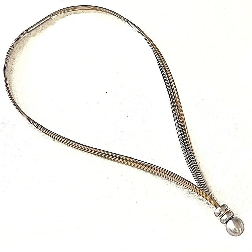 TeNo Genuine Diamond, Stainless Steel, & Gold Necklace!
